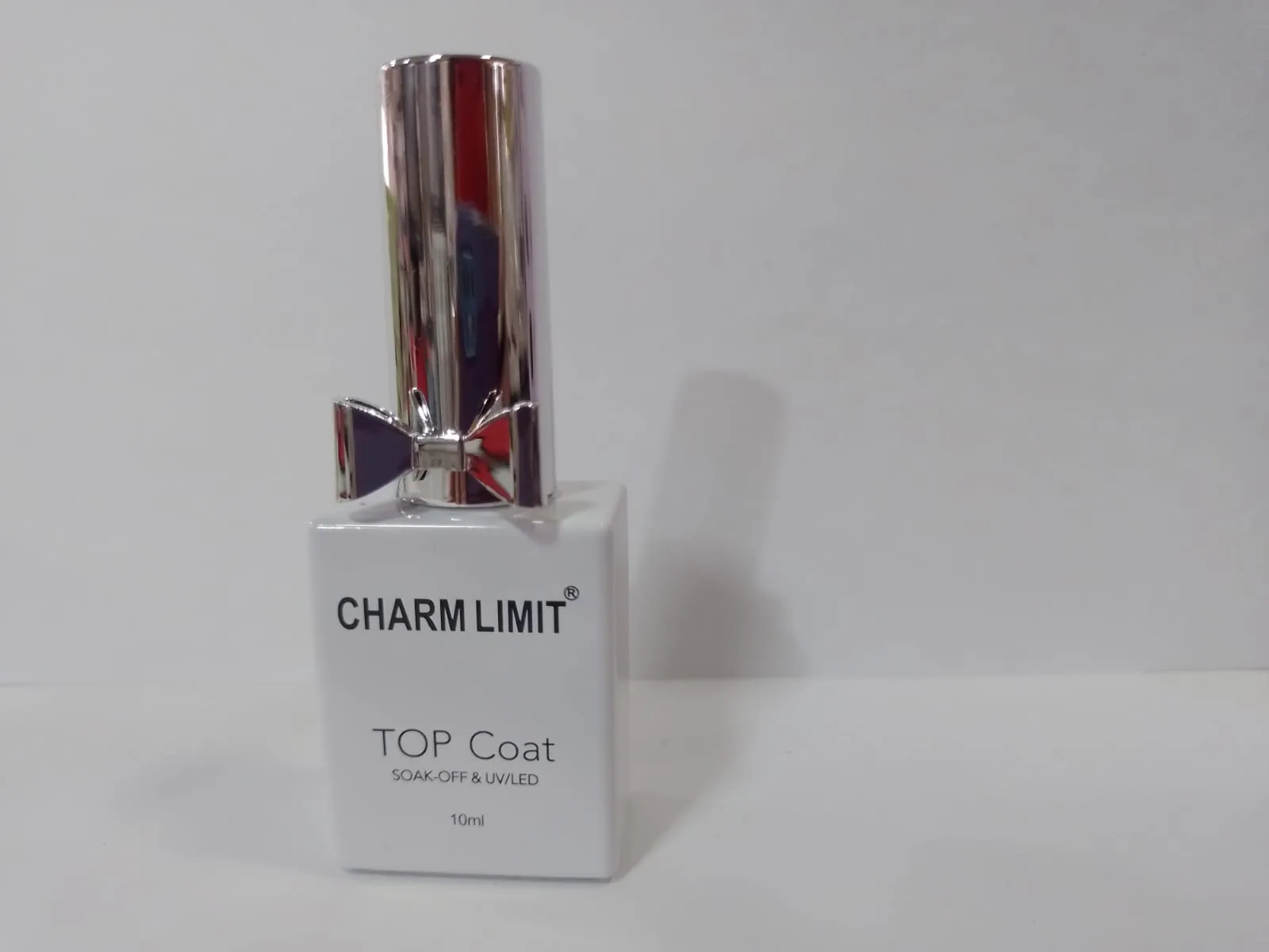 top coat charm limit moño