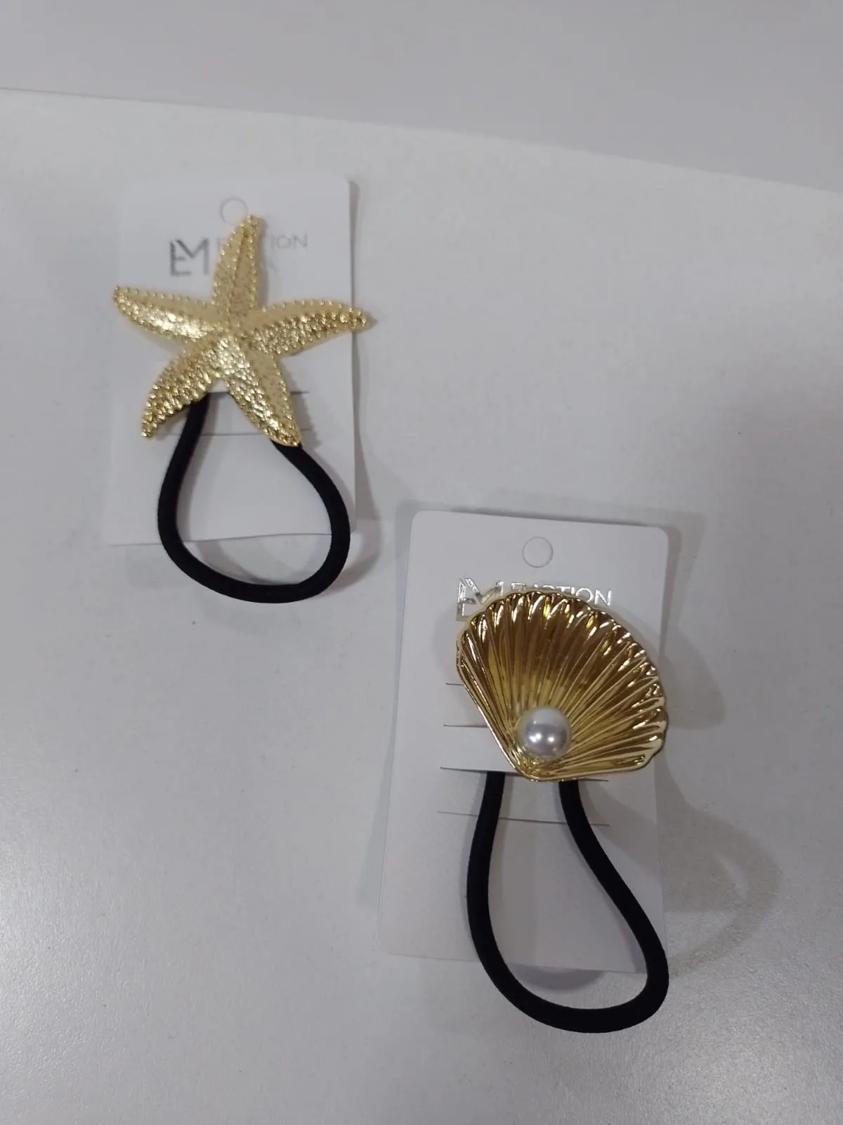 colita aplique de metal dorado y plateado