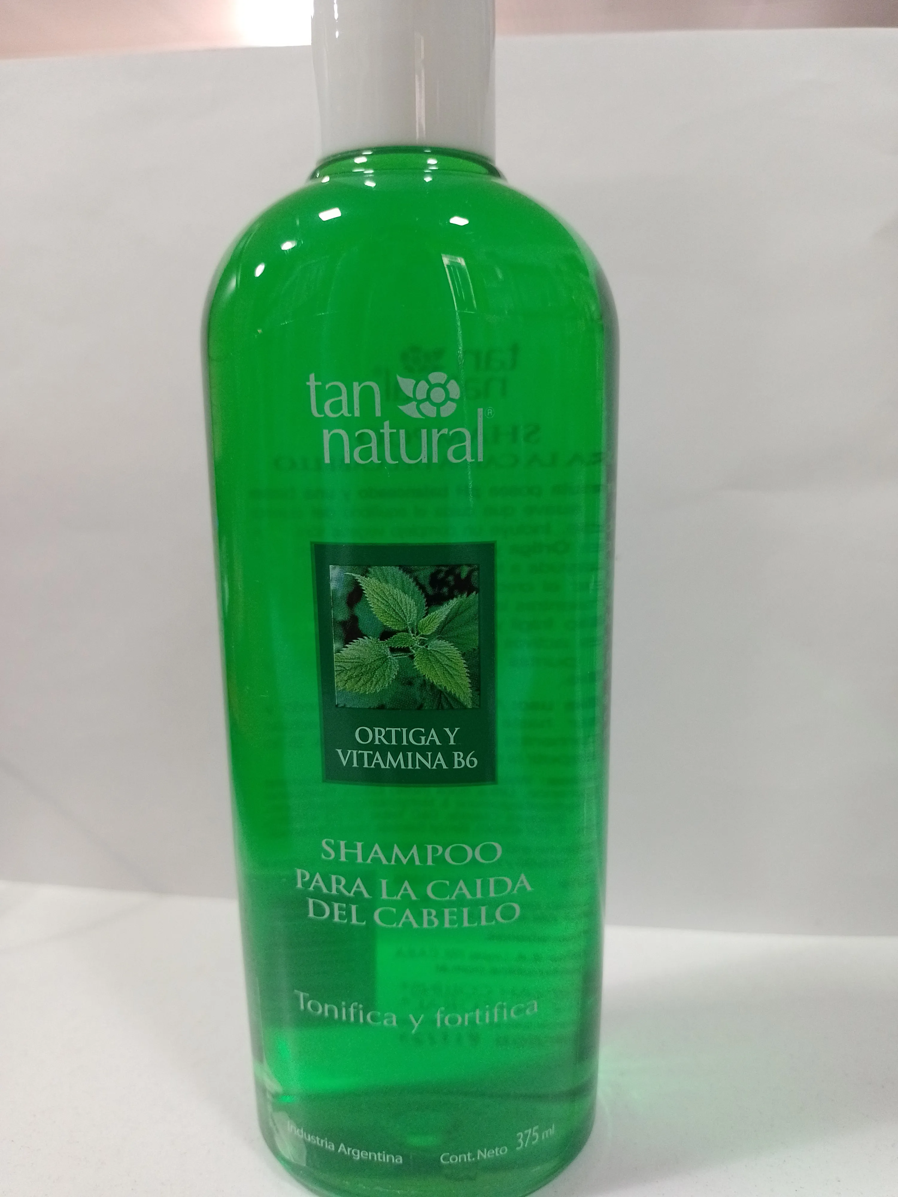 shampoo ortiga tan natural