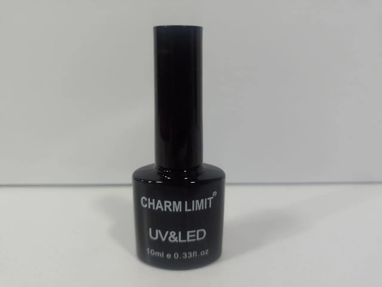 esmalte negro charm limit