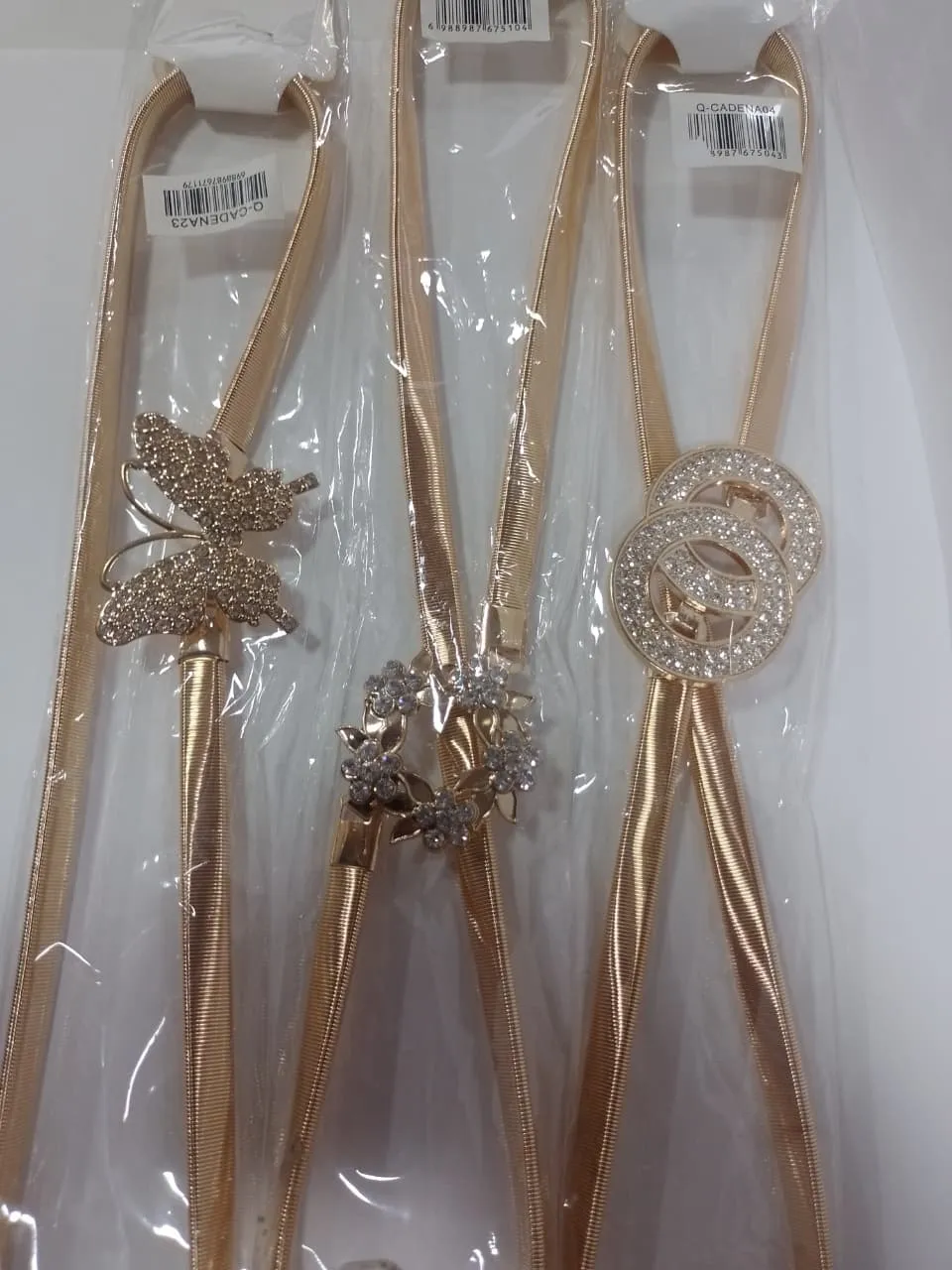 cinto elastizado dorado con strass