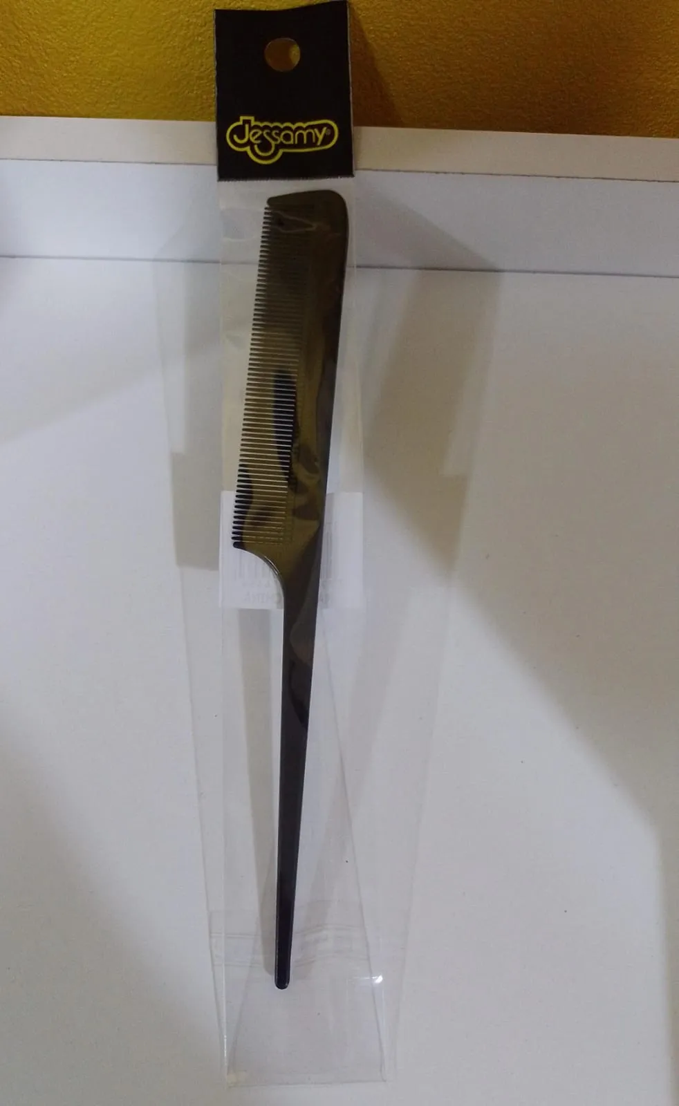 peine de cola negro