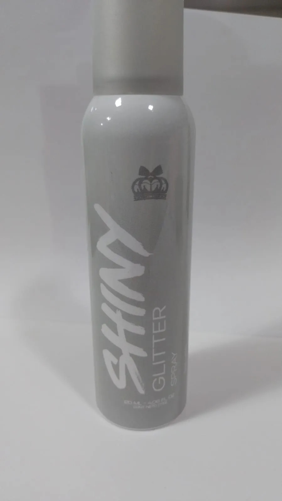 polvo de hadas en aerosol