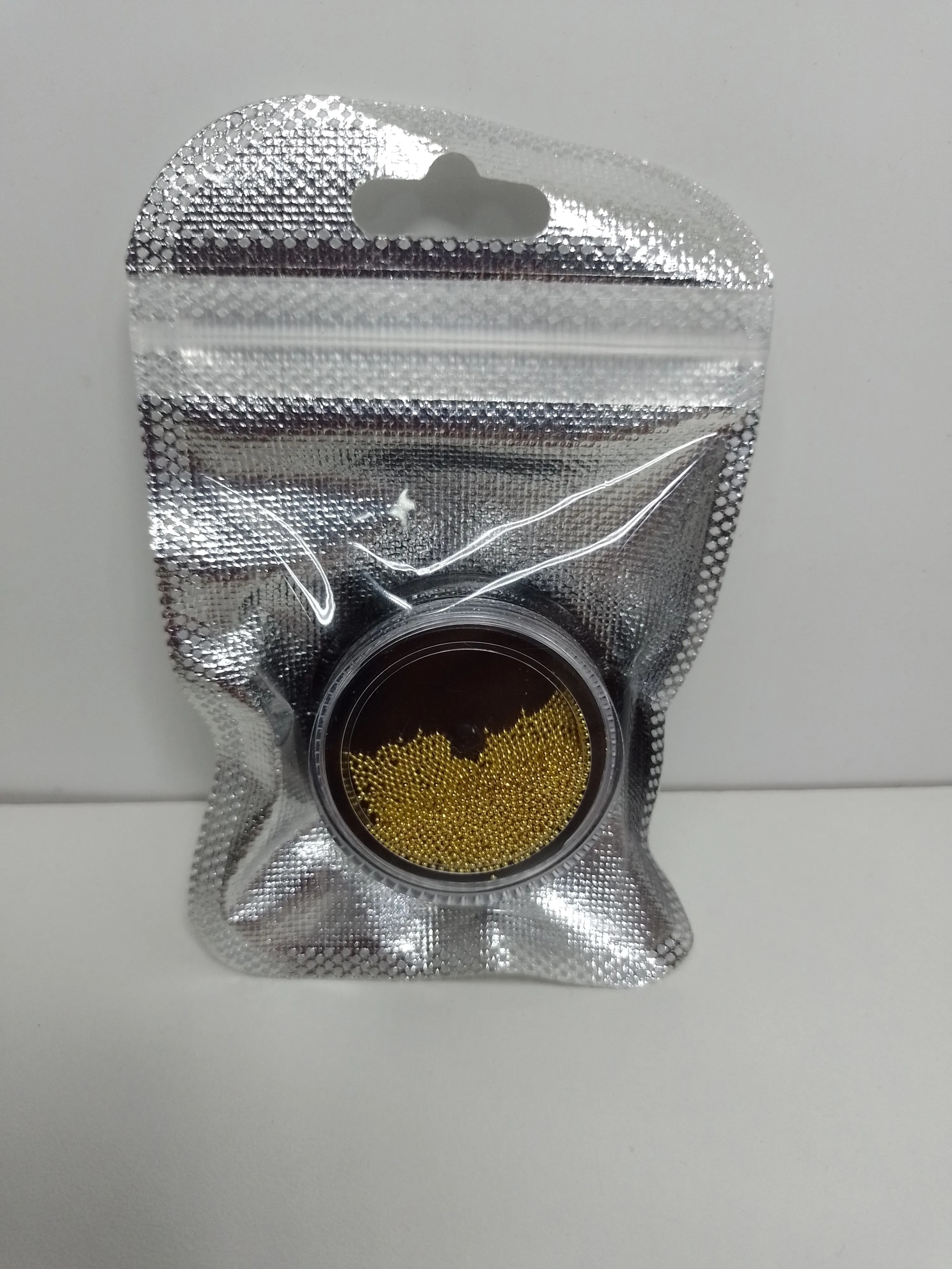 Caviar para uñas plateado y dorado